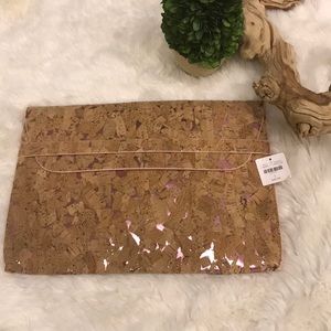 Anthropologie Cork Tech case with tags attached.